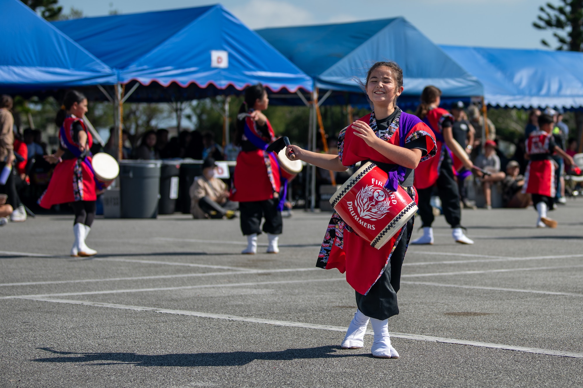Drummers perform.