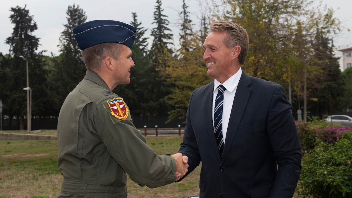39th ABW deputy commander shakes hand with U.S. Ambassador Jeffry Flake