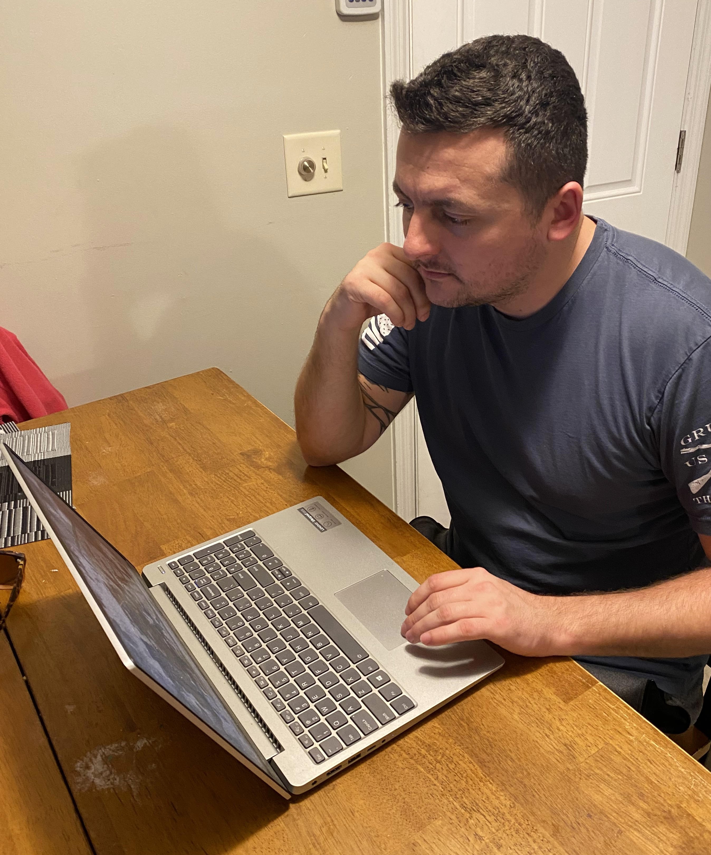 Chris Heckman, AFWERX fellow, works from home in Huber Heights, Ohio, Dec. 12, 2023. AFWERX fellowships are primarily virtual positions and are designed to cultivate a better understanding of current industry trends, broaden innovation perspectives and expose Airmen and Guardians to programs with a Department of the Air Force level impact. (Courtesy photo)