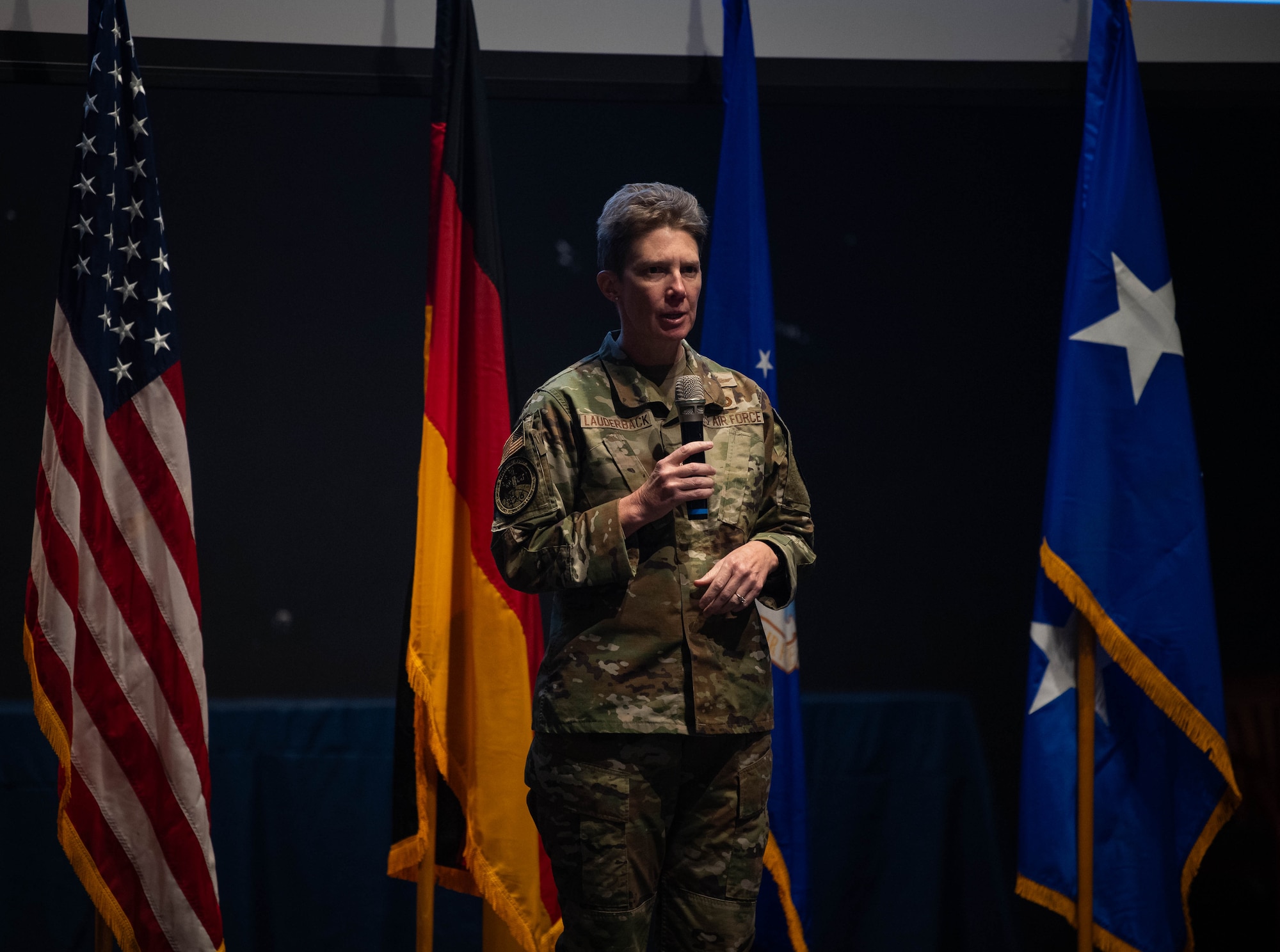 U.S. Air Force Lt. Gen. Leah G. Lauderback, intelligence, surveillance, reconnaissance and cyber effects operations deputy chief of staff, speaks during an all-call at Ramstein Air Base, Germany, Dec. 7, 2023. In addition to hosting an all-call, Lauderback visited sites and Airmen at intelligence and cyber units across Ramstein AB and Wiesbaden. (U.S. Air Force photo by Senior Airman Jared Lovett)