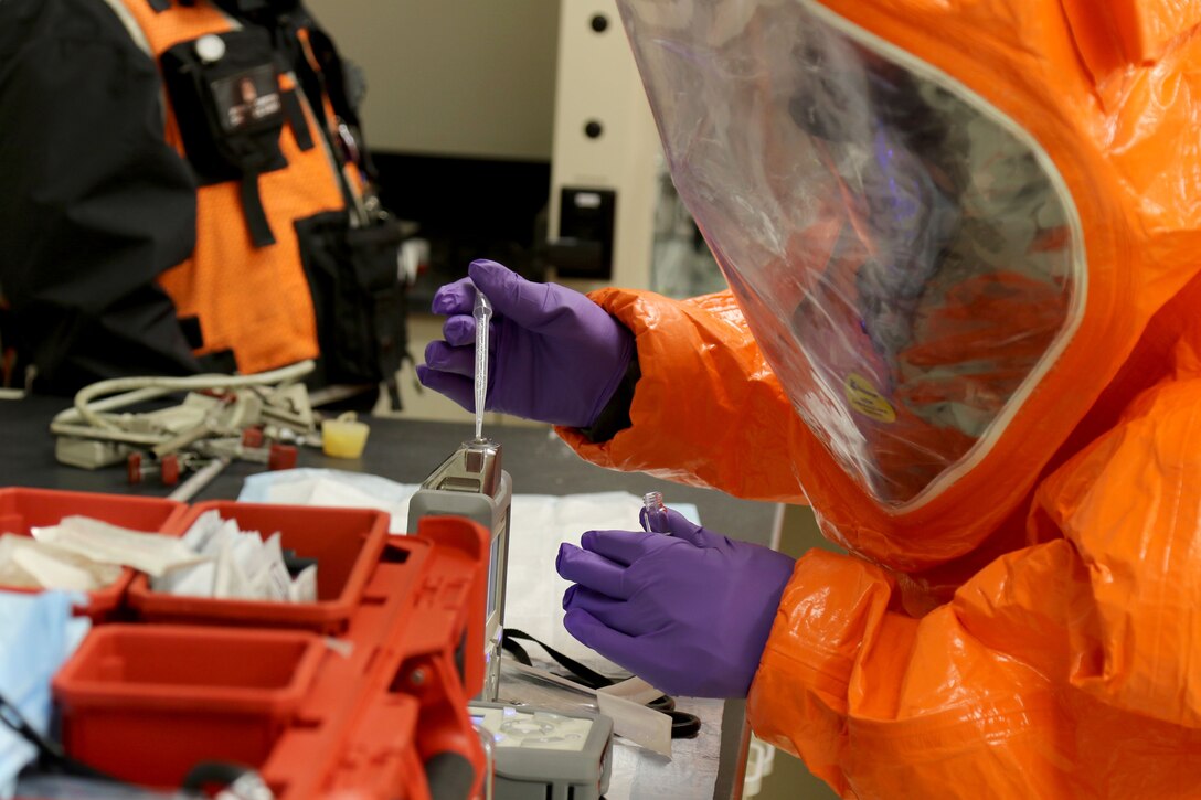 gt. First Class Christopher Rosenberger, a member of the Wisconsin National Guard’s 54th Civil Support Team, tests an unknown substance during a collective lanes training exercise in Madison, Wis., on March 8, 2022. The Madison-based CST is the state’s full-time response team for emergencies or terrorist events that involve weapons of mass destruction, toxic industrial chemicals or natural disasters. Wisconsin National Guard photo by Staff Sgt. Katie Theusch