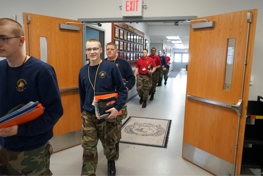 Wisconsin National Guard Challenge Academy cadets enter a classroom March 3, 2023 at the Academy’s Fort McCoy, Wis., campus. Challenge Academy is a free, voluntary, multi-phased intervention program targeting youth ages 15½ to 18 years who are at risk of not graduating high school. The 22-week residential phase helps cadets unlearn bad habits and instill core values to succeed in life. Wisconsin Challenge Academy photo