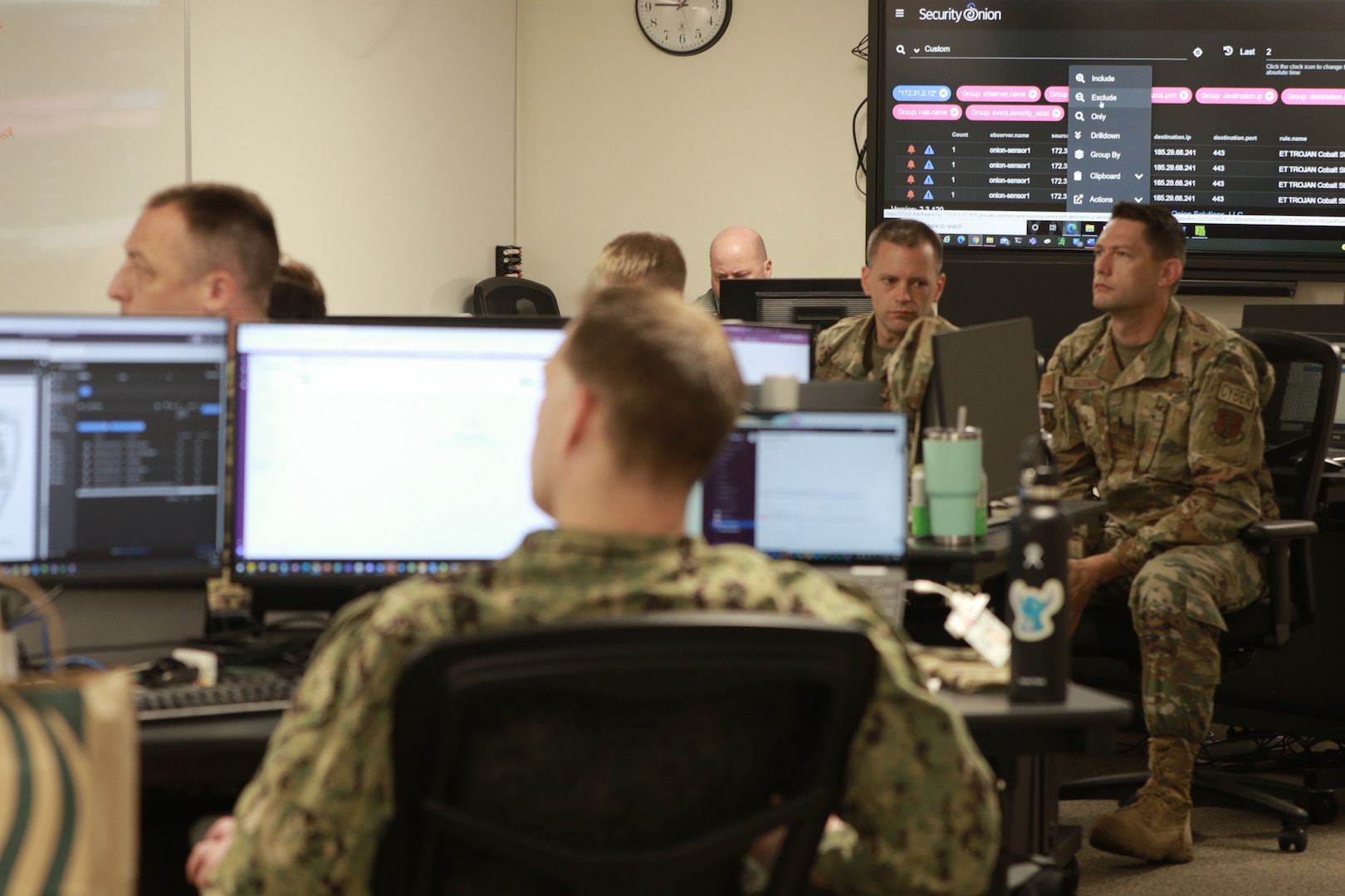 Wisconsin National Guard Defensive Cyber Operations Element and Cyber Response Team receive vital information to complete the mission during Cyber Shield 2022. Cyber Shield 2022 at the Army National Guard’s Professional Educational Center on Camp Robinson, Arkansas on June 13. Cyber Shield 2022 is the DOD’s largest unclassified inter-agency and joint national level training cyber defense exercise which includes representation from 20 states plus Guam. (U.S. Army photo by Illinois National Guard Capt. Clarissa Estrada).