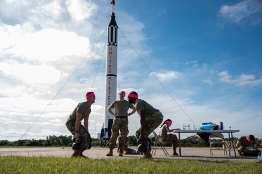  Guardians participate in the Guardian Arena 23 at the Cape Canaveral Space Force Museum at Cape Canaveral Space Force Station, Florida, Dec. 11, 2023. Teams of five members, consisting of United States Space Force officers, enlisted, government civilians, and USSF assigned Airmen, participated in a combined operation consisting of knowledge tests, problem solving exercises, and a physical challenge. The inaugural Guardian Arena instilled esprit de corps and provided an opportunity to dive into operationalizing the Guardian Ideal, Guardian Spirit, and Guardian Commitment. (U.S. Space Force photo by Senior Airman Samuel Becker)