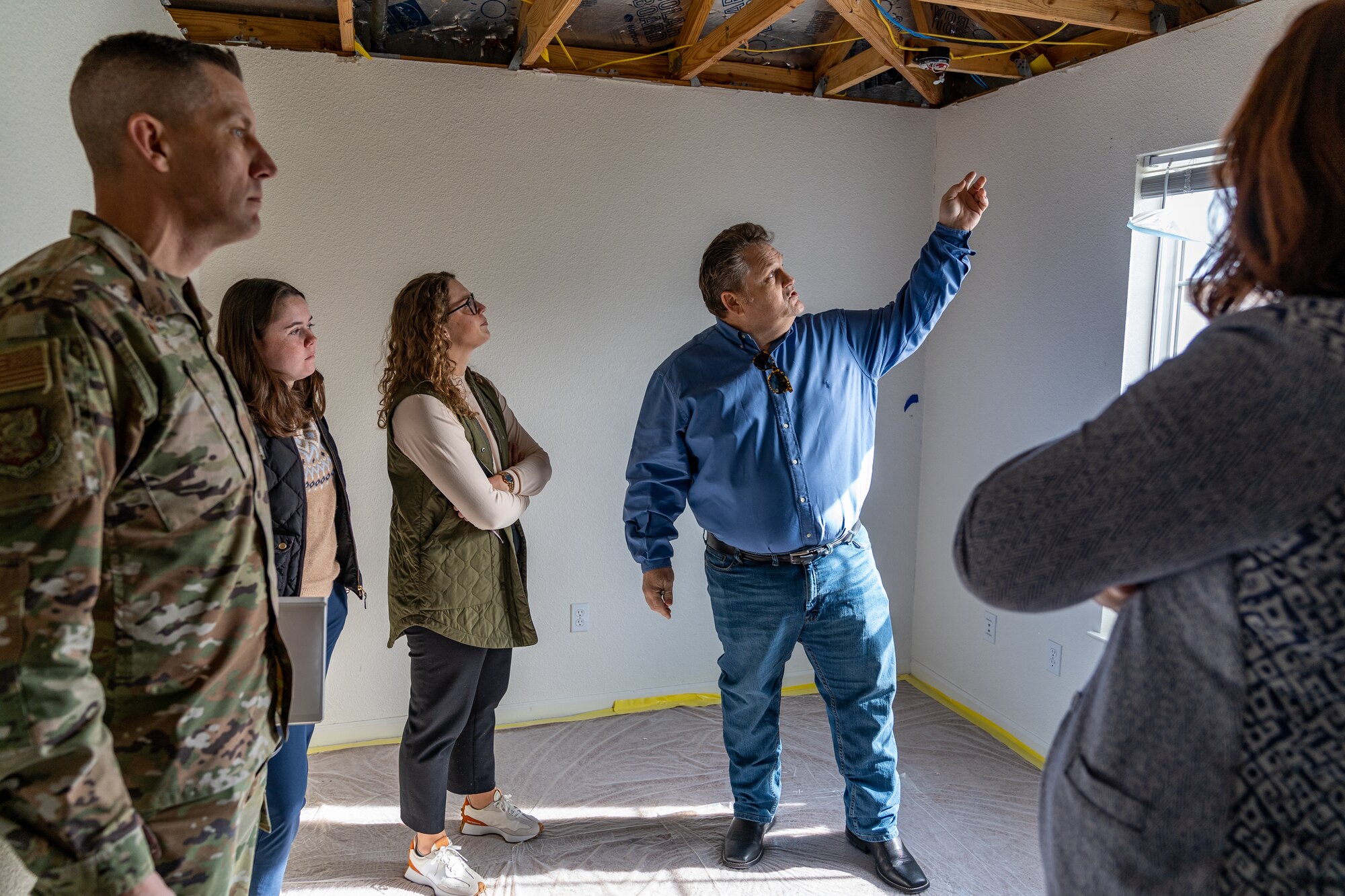 Members of the Senate Armed Services Committee tour base housing at Keesler Air Force Base, Mississippi, Dec. 6, 2023.