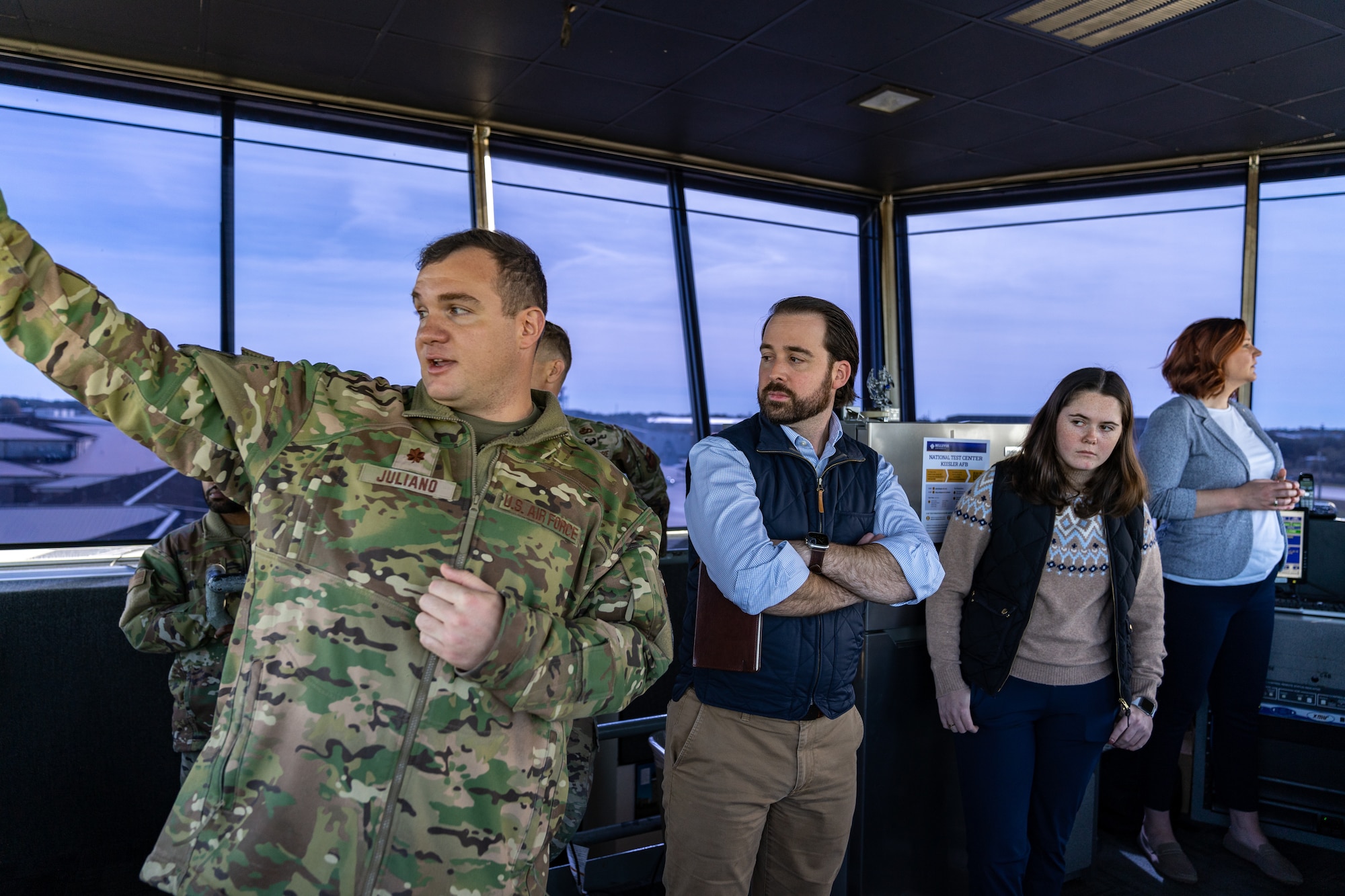 Brad Patout, Senate Armed Services Committee staff delegate, receives a brief from U.S. Air Force Maj. Nicholas Juliano, 81st Operations Support Flight commander, during a tour of the air traffic control tower at Keesler Air Force Base, Mississippi, Dec. 6, 2023.