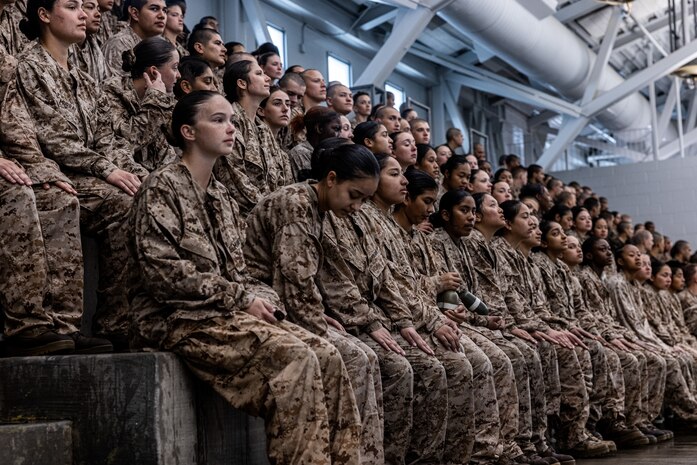 U.S. Marine Corps recruits with Echo Company, 2nd Recruit Training Battalion, receive a brief on swim techniques at Marine Corps Recruit Depot San Diego, Dec. 11, 2023. Basic swim qualification teaches recruits essential skills for executing water maneuvers and promotes combat readiness amongst recruits. (U.S. Marine Corps photo by Sgt. Jesse K. Carter-Powell)