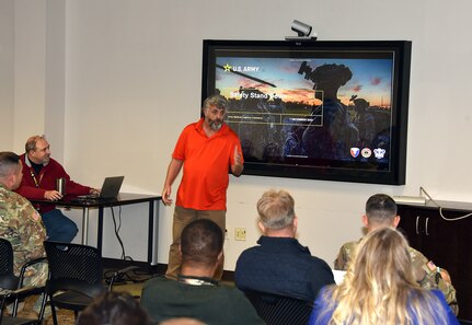 Safety Manager Ralph Davis leads U.S. Army Medical Logistics Command’s safety stand-down event Dec. 7, 2023, at Fort Detrick, Maryland.