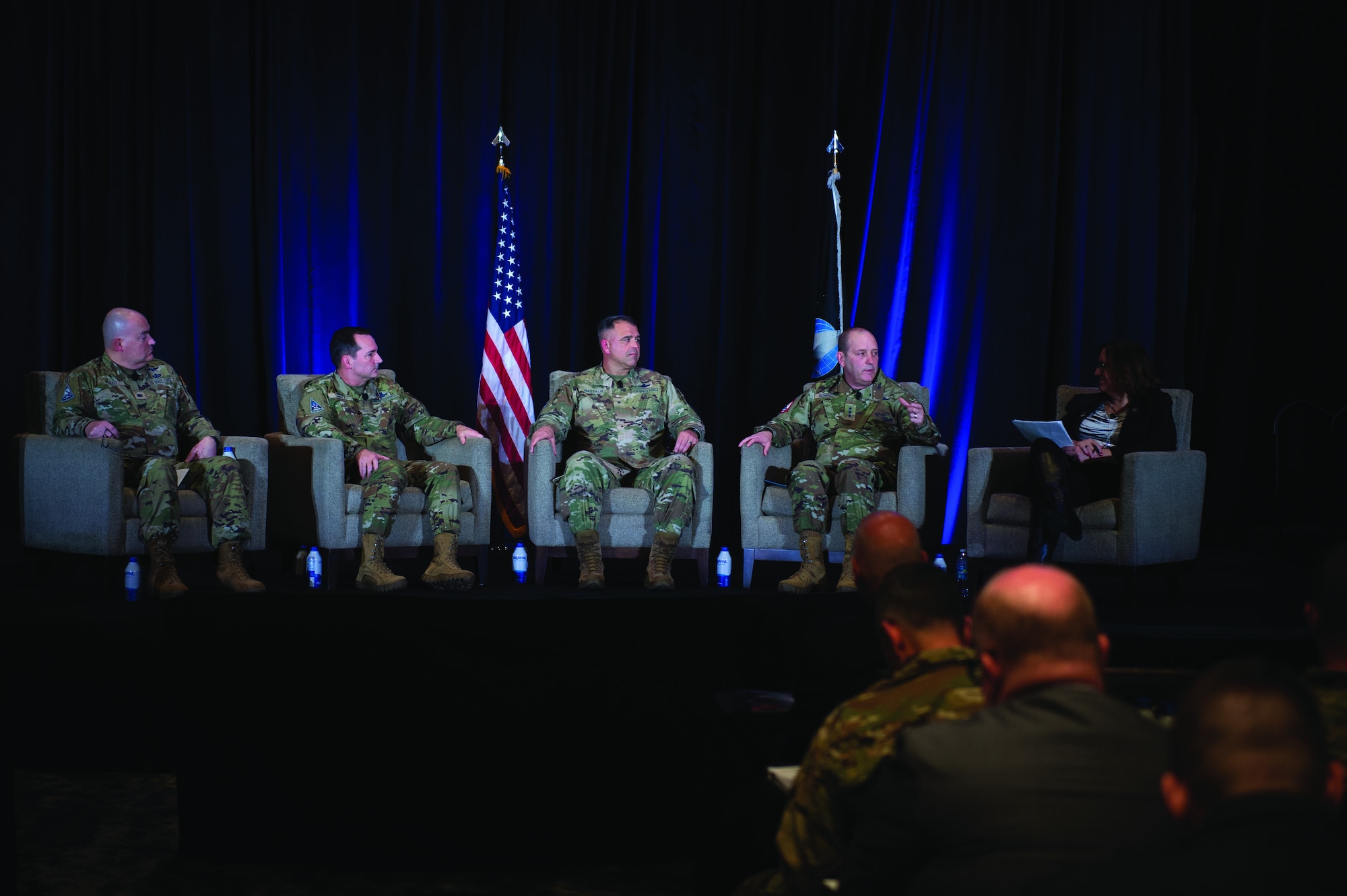 Brig. Gen. Anthony Mastalir, U.S. Space Forces Indo-Pacific commander,  and Lt. Gen. Douglas Schiess, U.S. Space Forces - Space commander, discuss how U.S. Space Force components interact with their counterparts in allied countries during the partner to win panel at the first Space Force Association’s Spacepower Conference in Orlando, Fla. Dec. 12-13, 2023. (U.S. Air Force photo by William A. O'Brien)