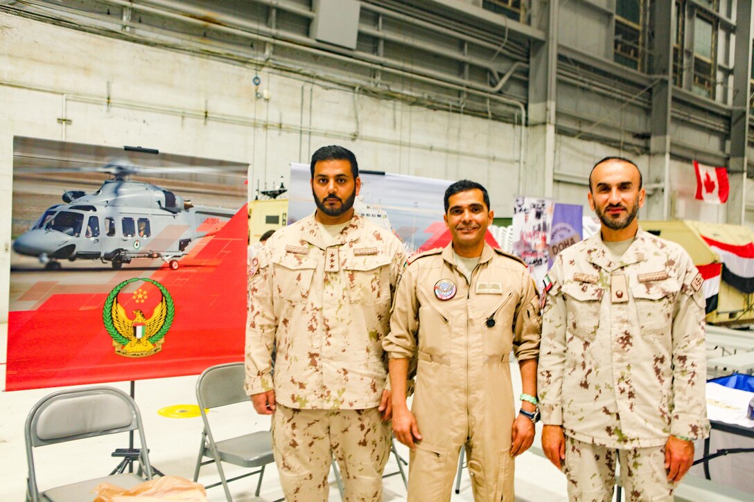TAMPA, Fla. - United Arab Emirates military personnel pose for a picture during U.S. Central Command’s (CENTCOM) International Night, Dec. 07, 2023. International Night started in December 2004 as a winter holiday party for the Coalition members and families. This year, members of CENTCOM’s coalition countries displayed native customs and offered a taste of their traditional cuisines to guests. (U.S. Central Command Public Affairs photo by Maged Benjamin-Elias)