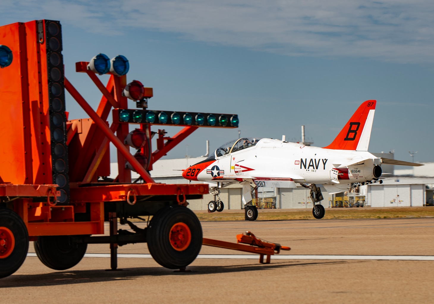 A T-45 out of Naval Air Station Kingsville,Texas, tests the Improved Fresnel Lens Optical Landing System (IFLOLS) at NAS Joint Reserve Base Fort Worth, Texas.