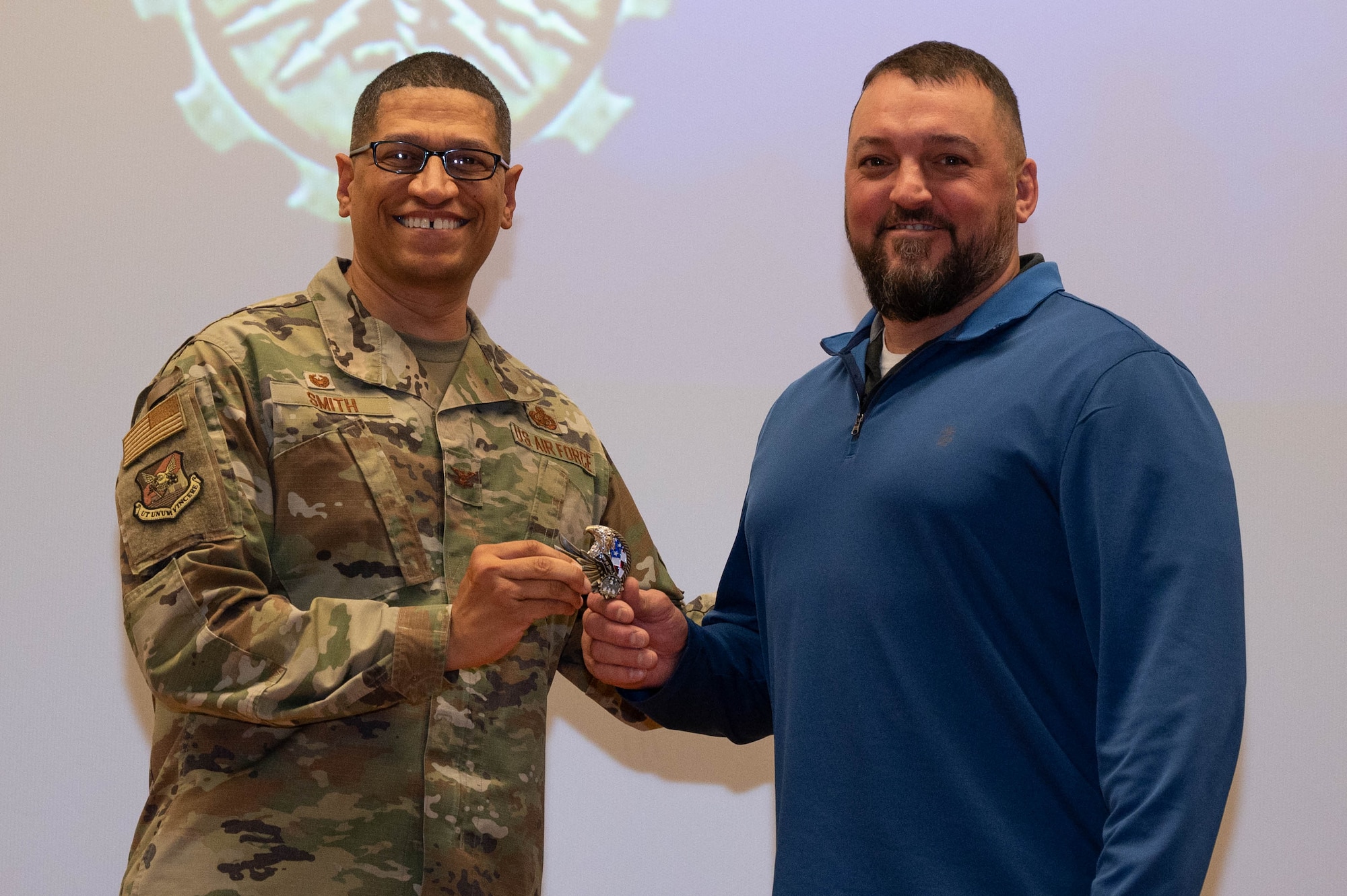 Joint Base McGuire-Dix-Lakehurst’s 87th Air Base Wing hosts a Commander’s Call presenting decorations and coins to outstanding members involved with the Phoenix Rally at JB MDL, N.J., Dec. 12, 2023. The Phoenix Rally took place on Oct 11-13 and hosted Senior Leaders from 5 major commands as well as Mobility Air Force. (U.S. Air Force photo by Airman 1st Class Aidan Thompson)