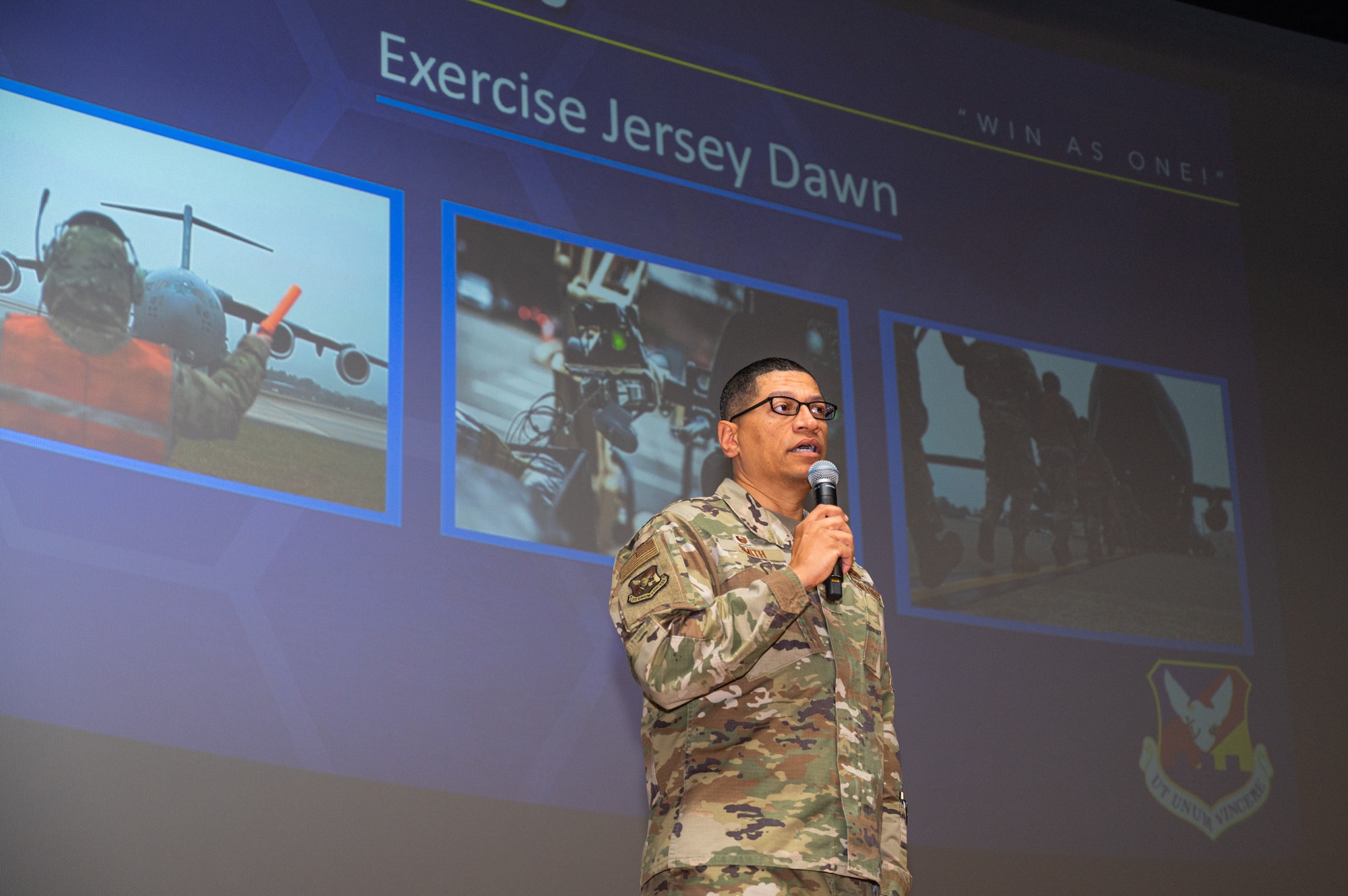 U.S. Air Force Col. Anthony L. Smith, Joint Base McGuire-Dix-Lakehurst commander and the 87th Air Base Wing commander, hosts a commanders call for members of the 87th ABW at JB MDL, N.J., Dec. 12, 2023. The commander's call highlighted recent accomplishments, the Warrior Connect program and presented awards to members from the 87th ABW. (U.S. Air Force photo by Senior Airman Sergio Avalos)