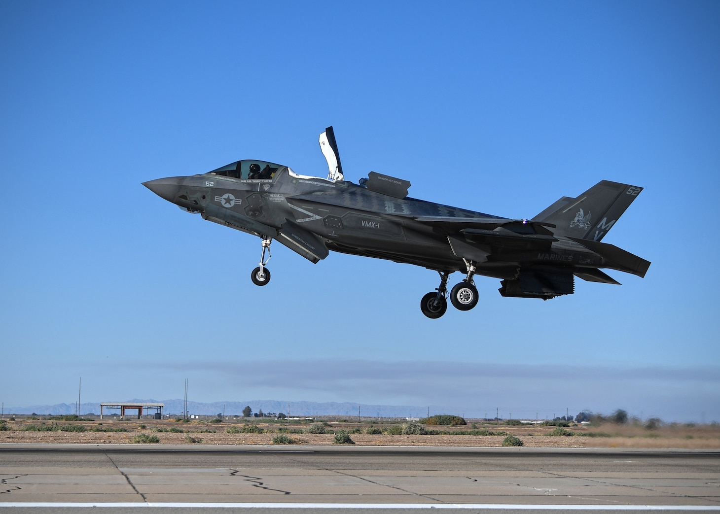 Marine Corps pilot, Maj. N.H. “Robo” Thayer conducts conventional landing of his F-35B Lightning II onboard Naval Air Facility (NAF) El Centro, Feb. 26, 2021. NAF El Centro supports joint service air combat training and readiness of the Warfighter. (U.S. Navy photo by Mass Communication Specialist 3rd Class Drew Verbis/Released) 210226-N-AS200-1429