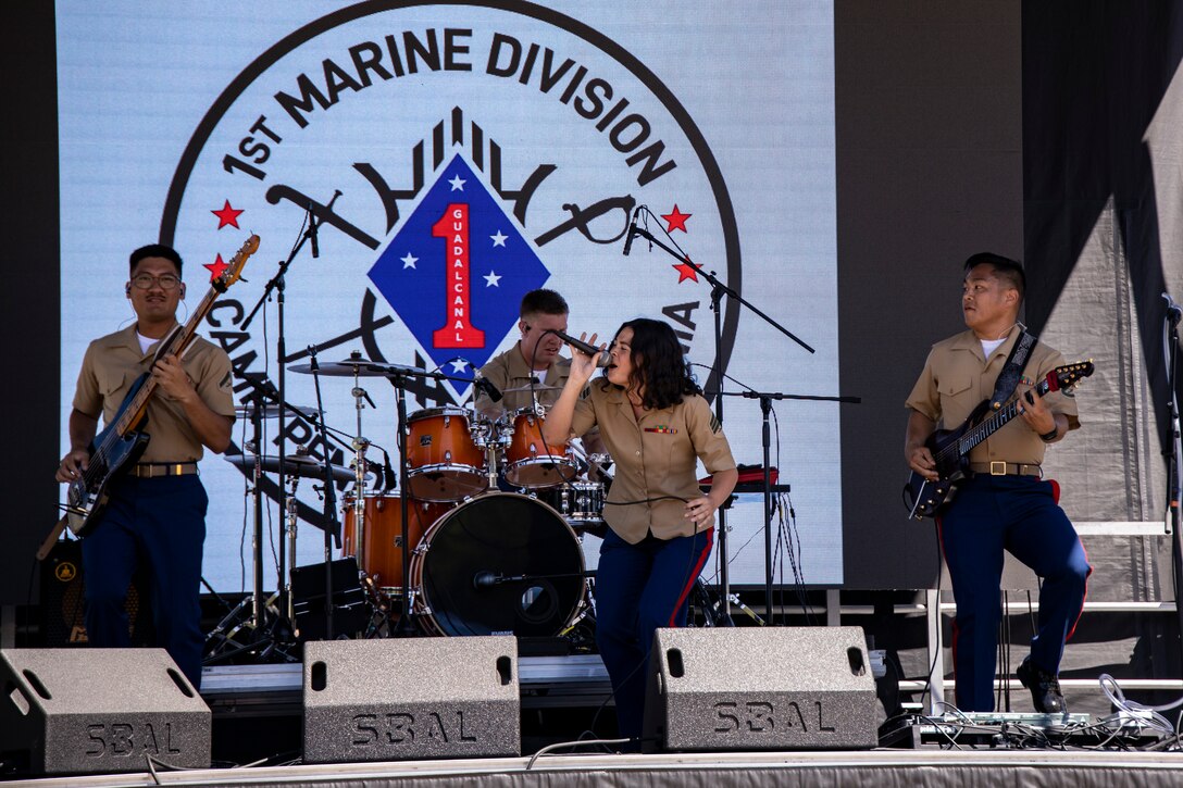 U.S. Marines with the 1st Marine Division Band, perform at the Seafair Festival in Seattle, Aug. 4, 2023. The Seafair Festival and Seattle Fleet Week offer people in the tri-state area an unparalleled opportunity to meet U.S. Marines, U.S. Navy Sailors, and U.S. Coast Guardsmen, and learn about the latest maritime capabilities. (U.S. Marine Corps photo by Sgt. Yvonna Guyette)