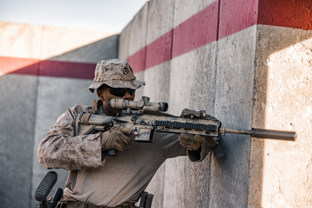 A U.S. Marine with 3rd Battalion, 4th Marine Regiment (REIN), 7th Marine Regiment, 1st Marine Division, provides security at Range 230 during Exercise Steel Knight 23.3 at Range 230 during Exercise Steel Knight 23.2 at Marine Corps Air-Ground Combat Center, Twentynine Palms, California, Dec. 5, 2023. Steel Knight is a three-phase exercise designed to train I Marine Expeditionary Force in the planning, deployment and command and control of a joint force against a peer or near-peer adversary combat force and enhance existing live-fire and maneuver capabilities of the Marine Air-Ground Task Force. (U.S. Marine Corps Photo by Lance Cpl. Justin J. Marty)