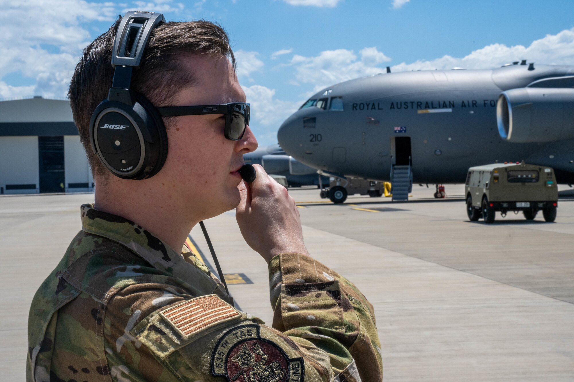 U.S. Air Force Senior Airman Anthony Wagnon, 535th Airlift Squadron loadmaster, observes an engine start prior to take off during Exercise Global Dexterity 23-2  at Royal Australian Air Force Base Amberley, Dec. 3, 2023.  Exercise Global Dexterity prepares our air forces for combined action in wartime, peacetime and humanitarian operations throughout the Indo-Pacific. (U.S. Air Force photo by Senior Airman Makensie Cooper)