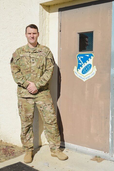 a man poses for a photo