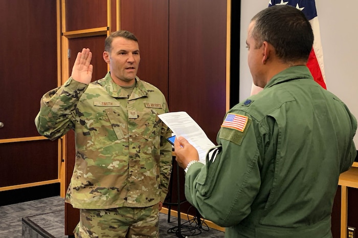 a man takes the oath of office