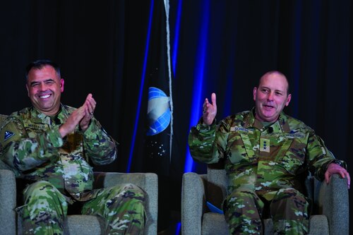 Brig. Gen. Anthony Mastalir, U.S. Space Forces Indo-Pacific commander,  and Lt. Gen. Douglas Schiess, U.S. Space Forces - Space commander, discuss how U.S. Space Force components interact with their counterparts in allied countries during the partner to win panel at the first Space Force Association’s Spacepower Conference in Orlando, Fla. Dec. 12-13, 2023. (U.S. Air Force photo by William A. O'Brien)