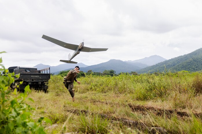 U.S. Marine Corps Sgt. Vincent Tran, a communications chief with Marine Rotational Force-Southeast Asia, I Marine Expeditionary Force, launches an RQ-20B small unmanned aerial system at a sUAS subject matter expert exchange during KAMANDAG 7 in Iwahig, Palawan, Philippines, Nov. 13, 2023. Marines from the U.S. and the Philippines shared their preferred methods of sUAS and how they employ these systems in the greater scope of warfare. KAMANDAG is an annual Philippine Marine Corps and U.S. Marine Corps-led exercise aimed at improving multinational readiness and mutual capabilities in the advancement of a Free and Open Indo-Pacific. This year marks the seventh iteration of this exercise and includes participants from Japan, the Republic of Korea, and observers from the United Kingdom. MRF-SEA is a Marine Corps Forces Pacific operational model that involves exchanges with subject matter experts, promotes security goals with Allies and Partners, and positions I MEF forces west of the International Date Line.