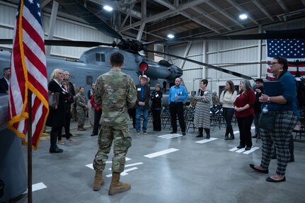 A U.S. Air Force Airman assigned to the 344th Training Squadron explains his technical school experience to civic leaders.