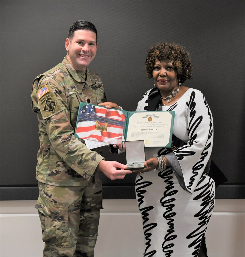 Lt. Col. Alex Duffy, U.S. Army Corps of Engineers, Savannah District deputy commander, presented Edwina Smalls, contract specialist, with a Department of the Army Civilian Service Commendation Medal, a DA Certificate of Appreciation, a commander’s coin and her 40-year certificate and pin. Smalls officially retires Dec. 29, 2023, after 41 years of federal service.