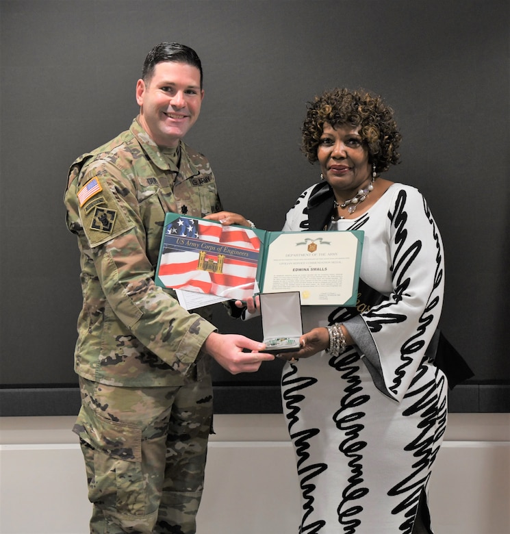 Lt. Col. Alex Duffy, U.S. Army Corps of Engineers, Savannah District deputy commander, presented Edwina Smalls, contract specialist, with a Department of the Army Civilian Service Commendation Medal, a DA Certificate of Appreciation, a commander’s coin and her 40-year certificate and pin. Smalls officially retires Dec. 29, 2023, after 41 years of federal service.