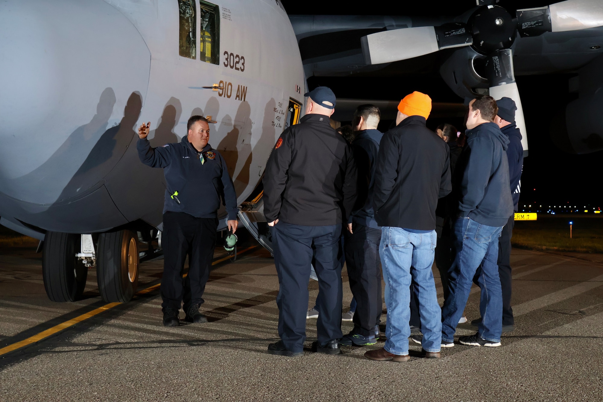 Dan Jones, a firefighter from Youngstown Air Reserve Station, Ohio, instructs firefighters from Erie, Pennsylvania, on aircraft emergency response while at Erie International Airport Tom Ridge Field, Nov. 10, 2023.