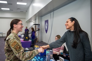 U.S. Air Force Airman interacting with Weber State University Staff during Affinity Summit
