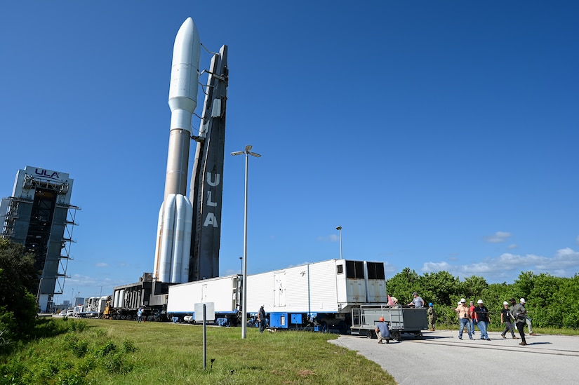 A rocket is staged at a launch facility.