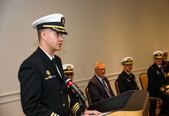 Cmdr. Michael Huber speaks during the change of command ceremony for the Pre-Commissioning Unit (PCU) Arkansas (SSN 800) at the Mariners’ Museum and Park in Newport News, Virginia.