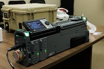 Pictured above, MCSC's Portable Patient Transport Life Support System is an advanced medical device capable of generating its own oxygen, providing ventilation for both pediatric and adult patients, offering comprehensive physiological monitoring, and featuring integrated suction capabilities. This all-in-one solution ensures continuous critical care during patient transport in contested areas.