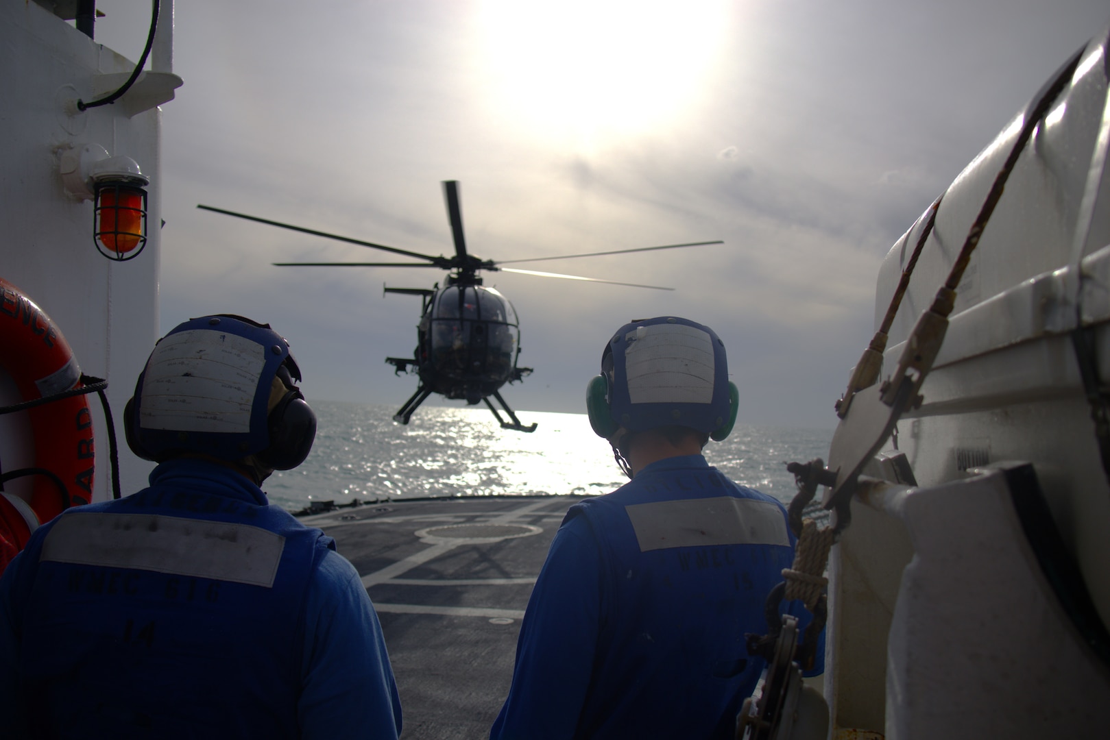 The crew of U.S. Coast Guard Cutter Diligence (WMEC 616) conducts joint training with the U.S. Army 160th Special Operations Aviation Regiment off the coast of Tampa, Florida, Dec. 12, 2023. During the exercise, the Diligence crew and pilots from SOAR completed daytime and nighttime helicopter landing evolutions.