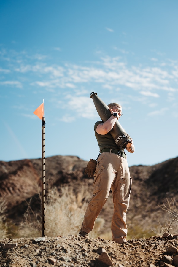 U.S. Marine Corps Sgt. Taylor Tenley, a Freedom, Wisconsin native, explosive ordnance disposal technician with Marine Air-Ground Task Force Training Command, Marine Corps Air-Ground Combat Center, carries an explosive during a Standoff Munitions Disrupt test at MCAGCC, Twentynine Palms, California, Nov. 28, 2023. Infantry Weapons Marine Corps Systems Command personnel conducted weapons testing at MCAGCC in order to collect test data using the Special Application Scoped Rifle, Semi-automatic Sniper System, and MK22 against several high explosive filled ordnance items. (U.S. Marine Corps photo by Lance Cpl. Richard PerezGarcia)