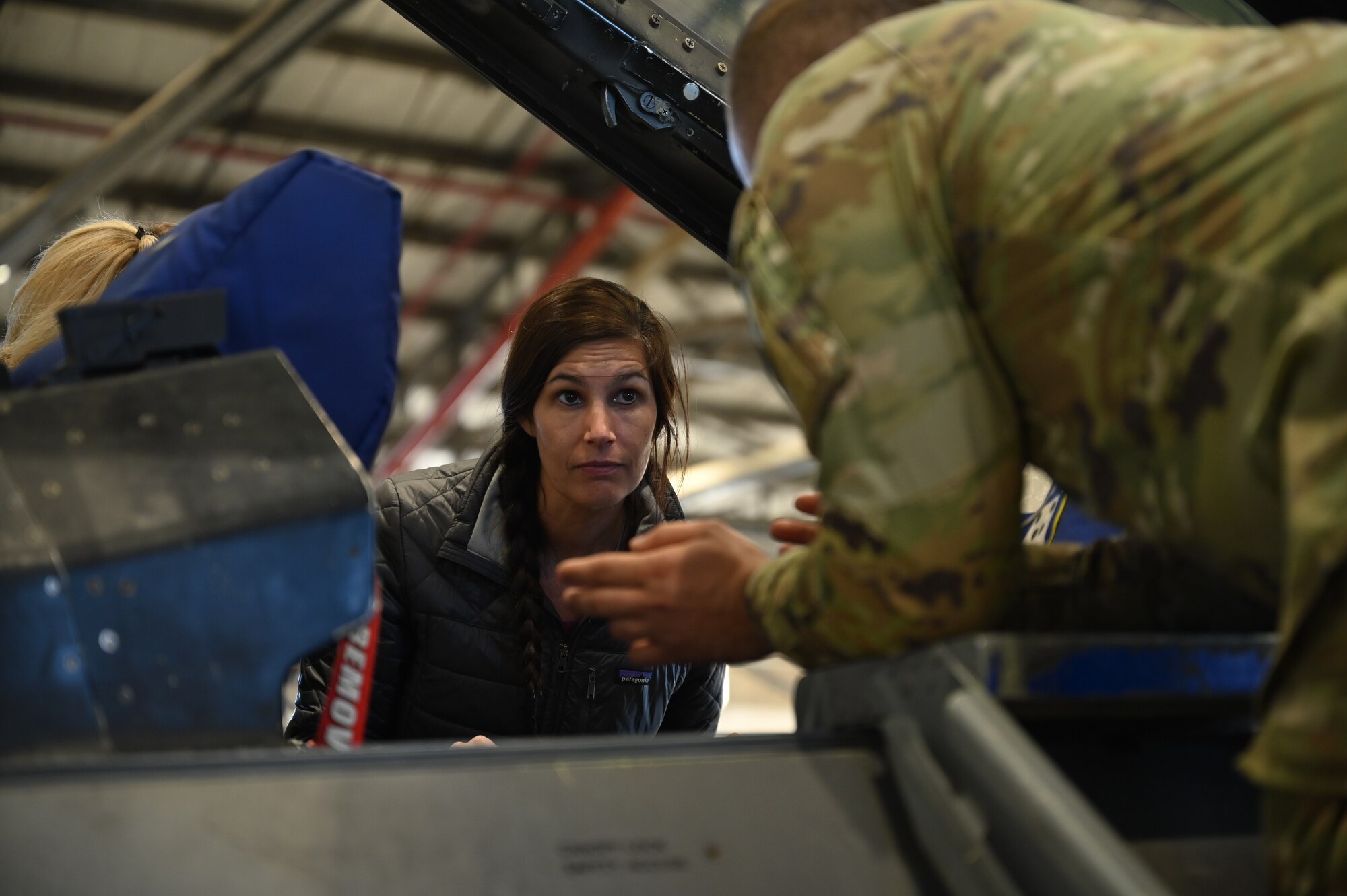 Woman looks into cockpit