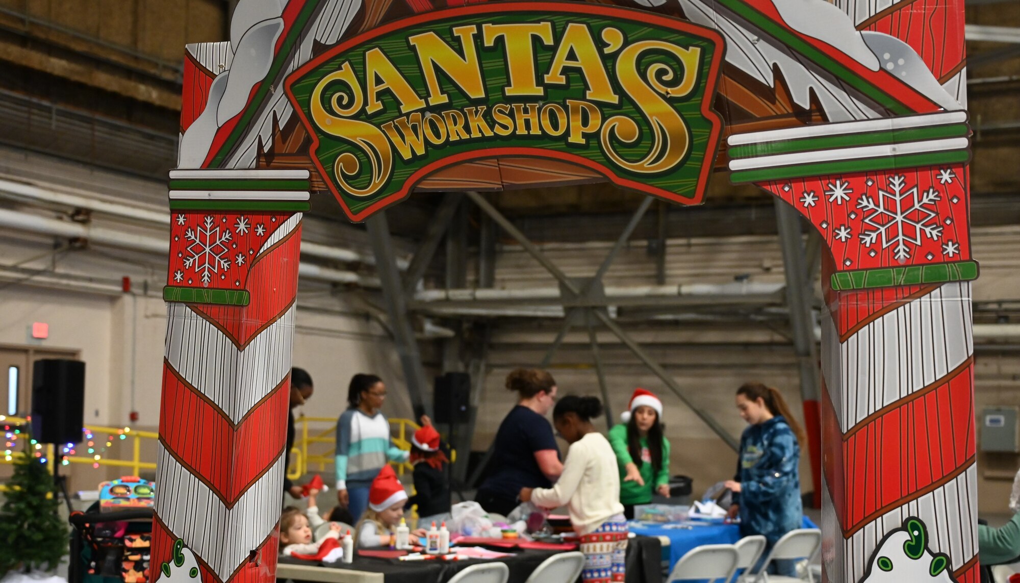 Service members and their families enjoyed a variety of festive activities including arts and crafts, a bouncy house, pictures with Santa and complimentary food during the event.