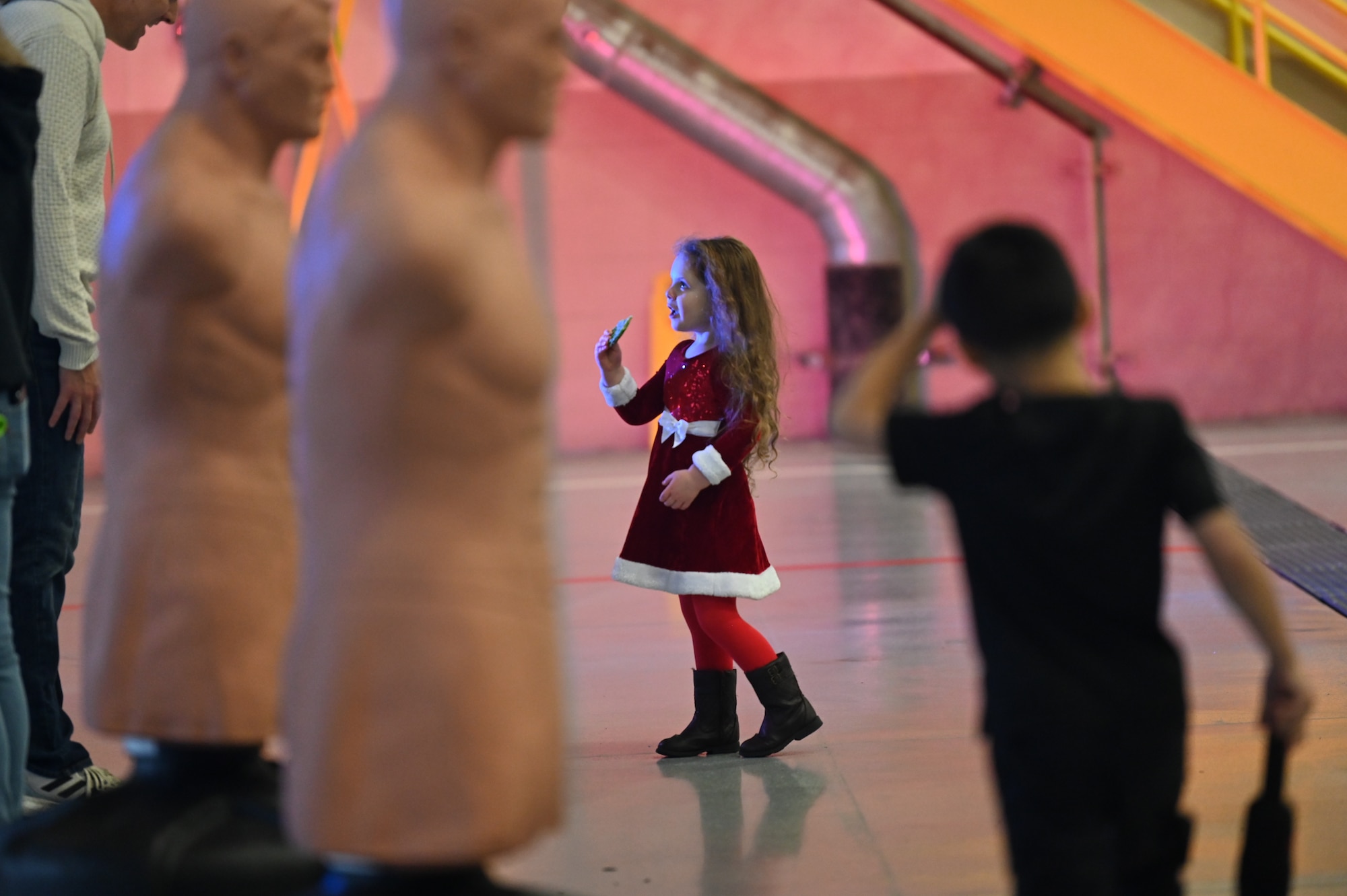 Service members and their families enjoyed a variety of festive activities including arts and crafts, a bouncy house, pictures with Santa and complimentary food during the event.
