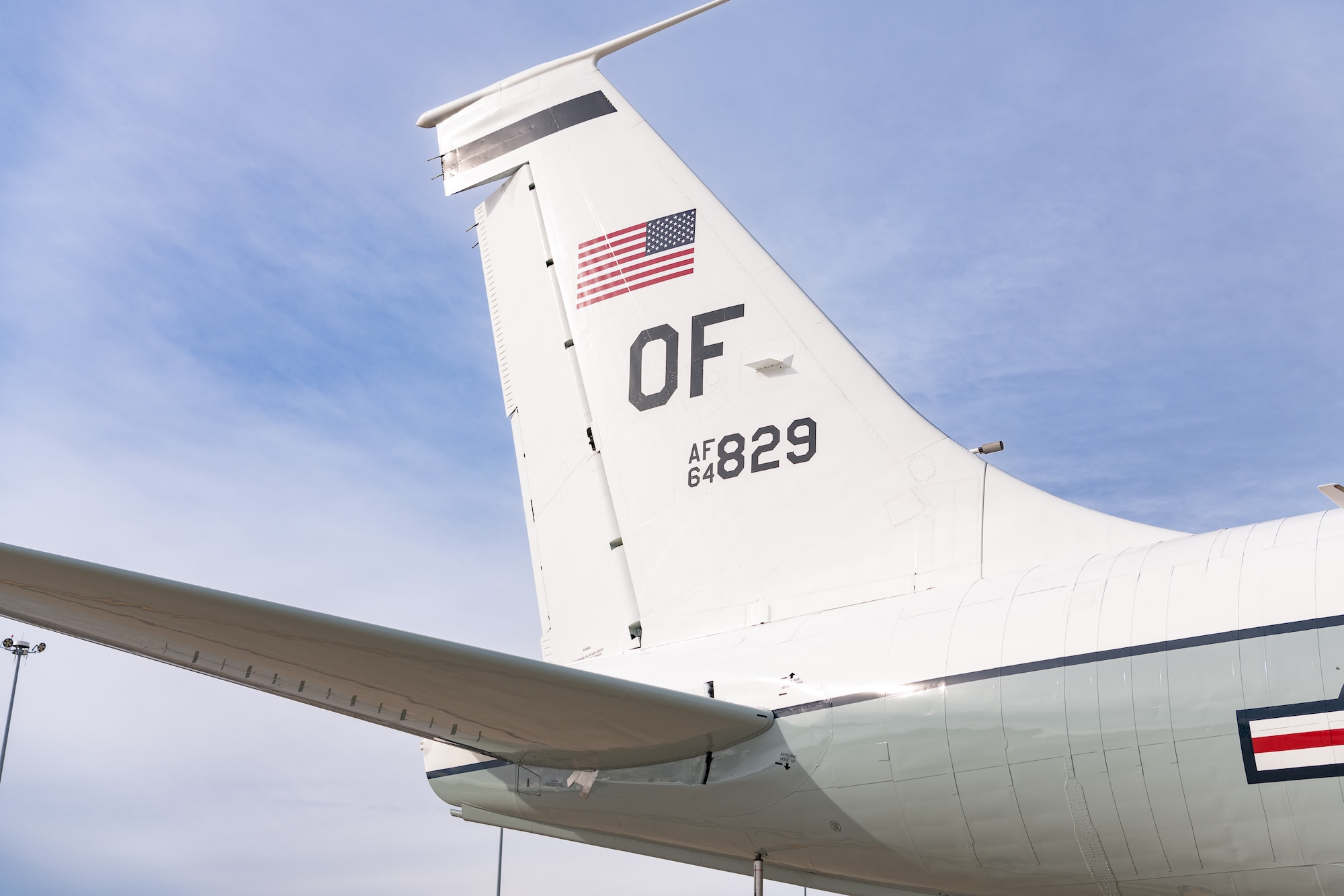 Upward angle photo of an aircrafts vertical stabilizer.