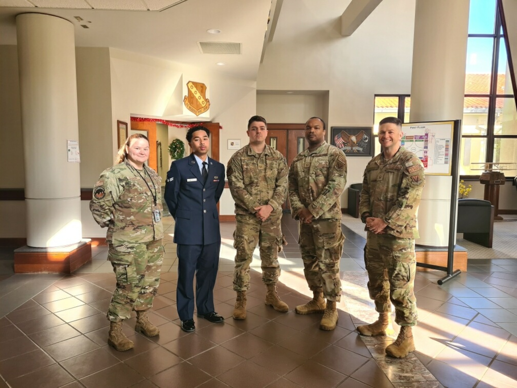 Airman pose for group photo at in person BTZ board. Team Maxwell-Gunter re-established in-person panels for Airman 1st Class promoting to Senior Airman under the Senior Airman Below the Zone program, August 2023.