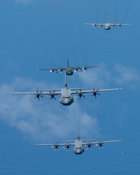 Photo of Cargo aircraft from Japan, U.S., Canada, and the Republic of Korea flying together over the Pacific.