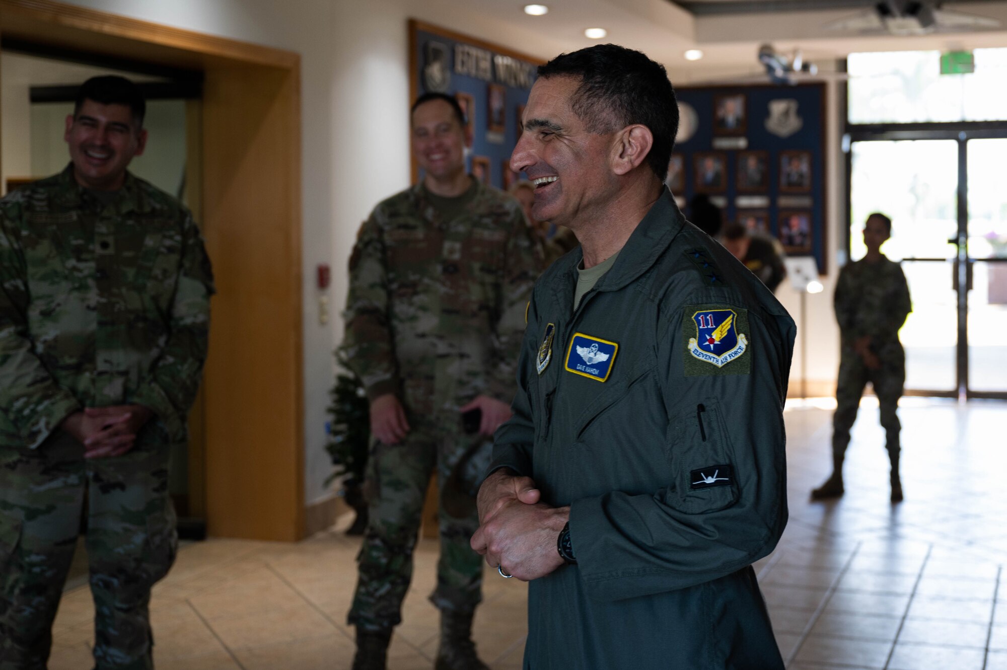 U.S. Air Force Lt. Gen. David Nahom, commander of Alaskan NORAD Region, Alaskan Command and Eleventh Air Force, speaks to Airmen of the 15th Wing during an installation tour at Joint Base Pearl Harbor-Hickam, Hawaii, Dec. 7, 2023. Nahom met with numerous leaders within the 15th Wing to better understand the installation’s unique mission and capabilities. (U.S. Air Force photo by 2nd Lt. Margaret Blice)