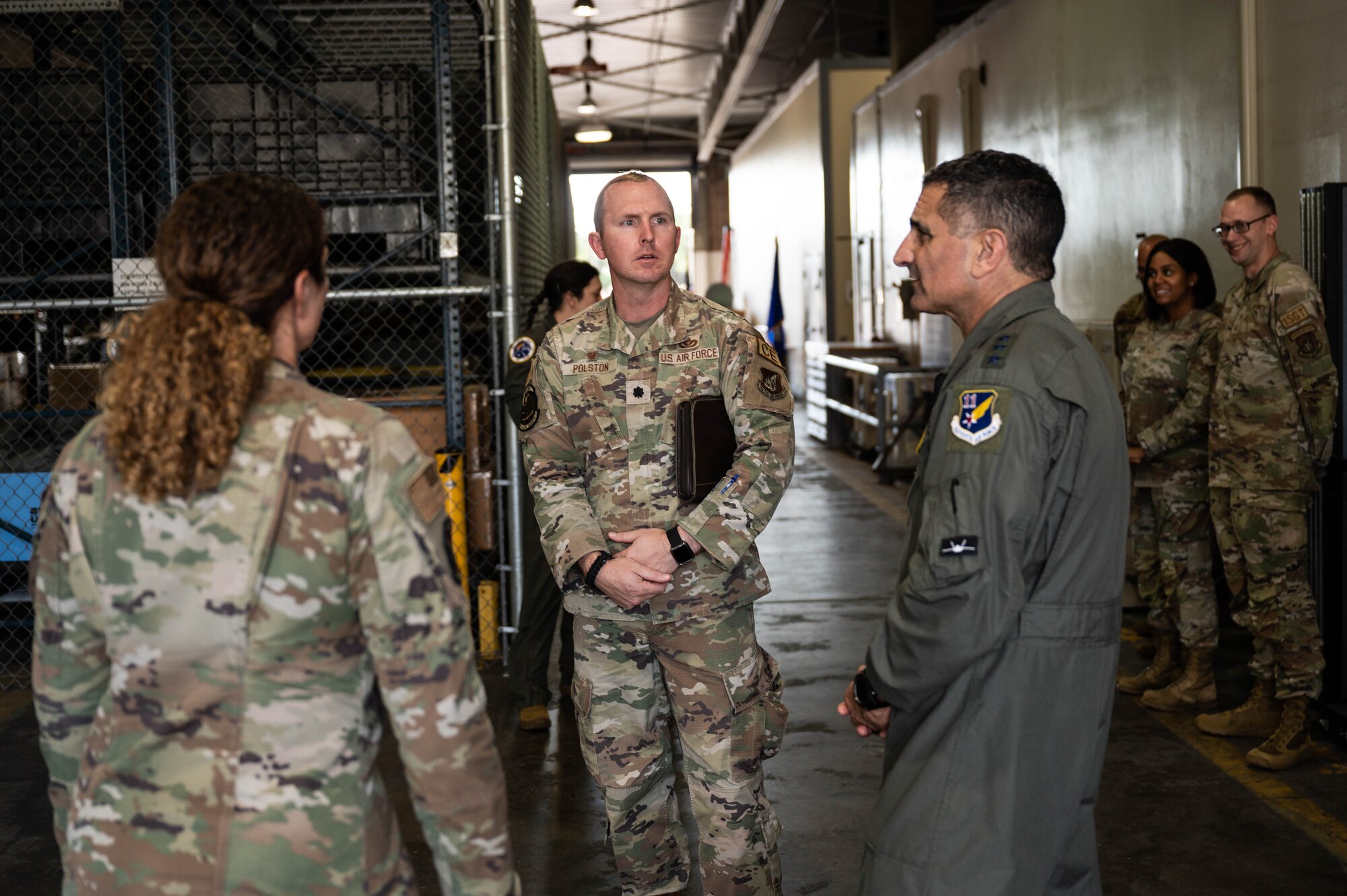 U.S. Air Force Lt. Col. Jonathan Polston, 647th Civil Engineering Squadron commander, briefs U.S. Air Force Lt. Gen. David Nahom, commander of Alaskan NORAD Region, Alaskan Command and Eleventh Air Force, during a tour of the 15th Wing at Joint Base Pearl Harbor-Hickam, Hawaii, Dec. 7, 2023. Nahom met with numerous leaders within the 15th Wing to better understand the installation’s unique mission and capabilities. (U.S. Air Force photo by 2nd Lt. Margaret Blice)