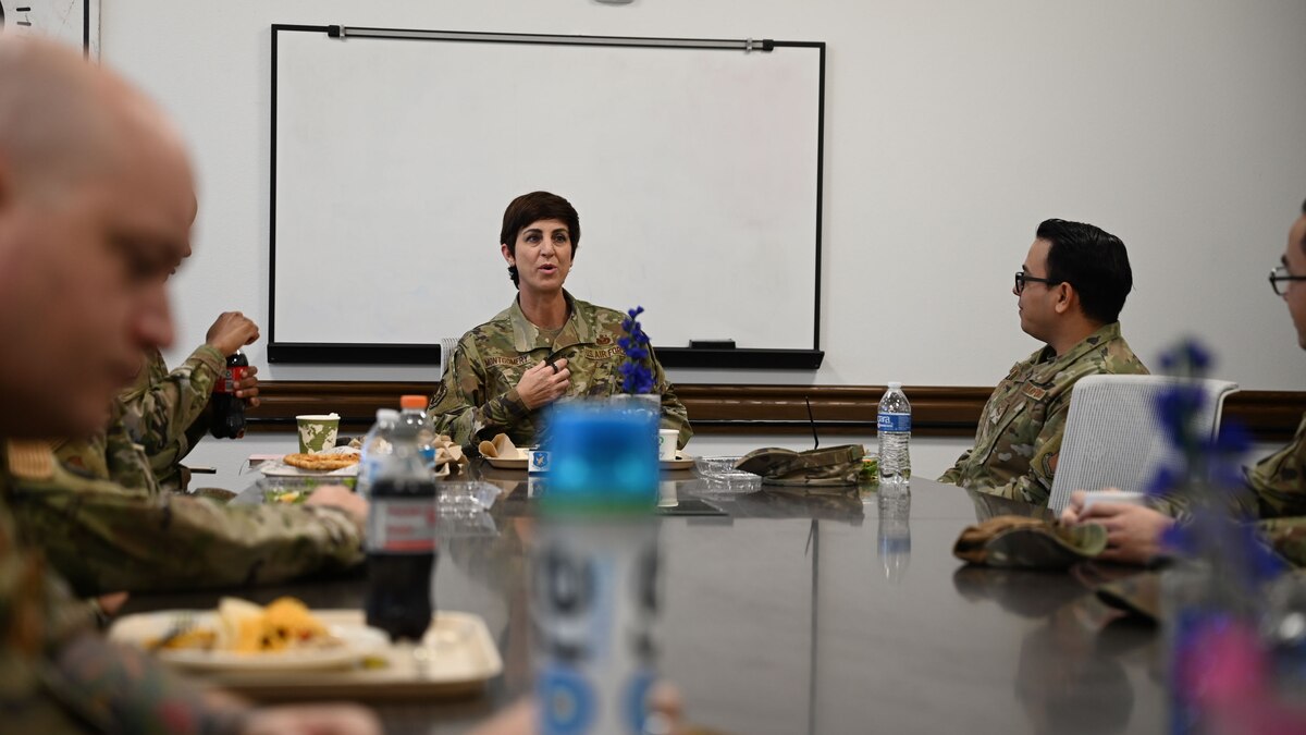 U.S. Air Force Chief Master Sgt. Kristina Montgomery, 2nd Air Force command chief, sits down with noncommissioned officers across the base for a lunch discussion at the Cressman Dining Facility, Goodfellow Air Force Base, Texas, Dec. 8, 2023. Montgomery encouraged the participants to share real concerns and have an opportunity to be heard. (U.S. Air Force photo by Airman 1st Class Evelyn D’Errico)