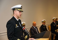 Cmdr. Michael Huber speaks during the change of command ceremony for the Pre-Commissioning Unit (PCU) Arkansas (SSN 800) at the Mariners’ Museum and Park in Newport News, Virginia.