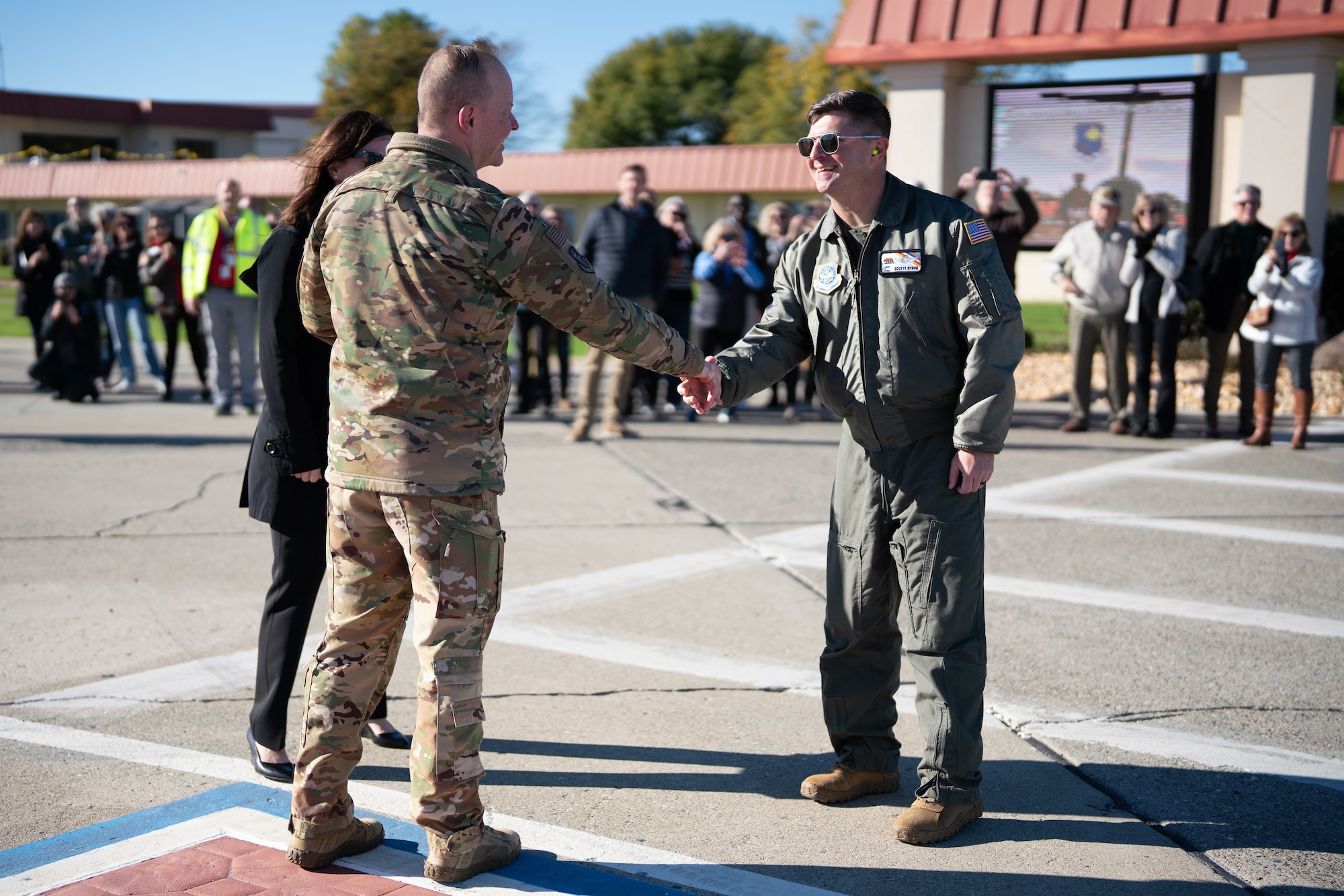 Leadership greet each other