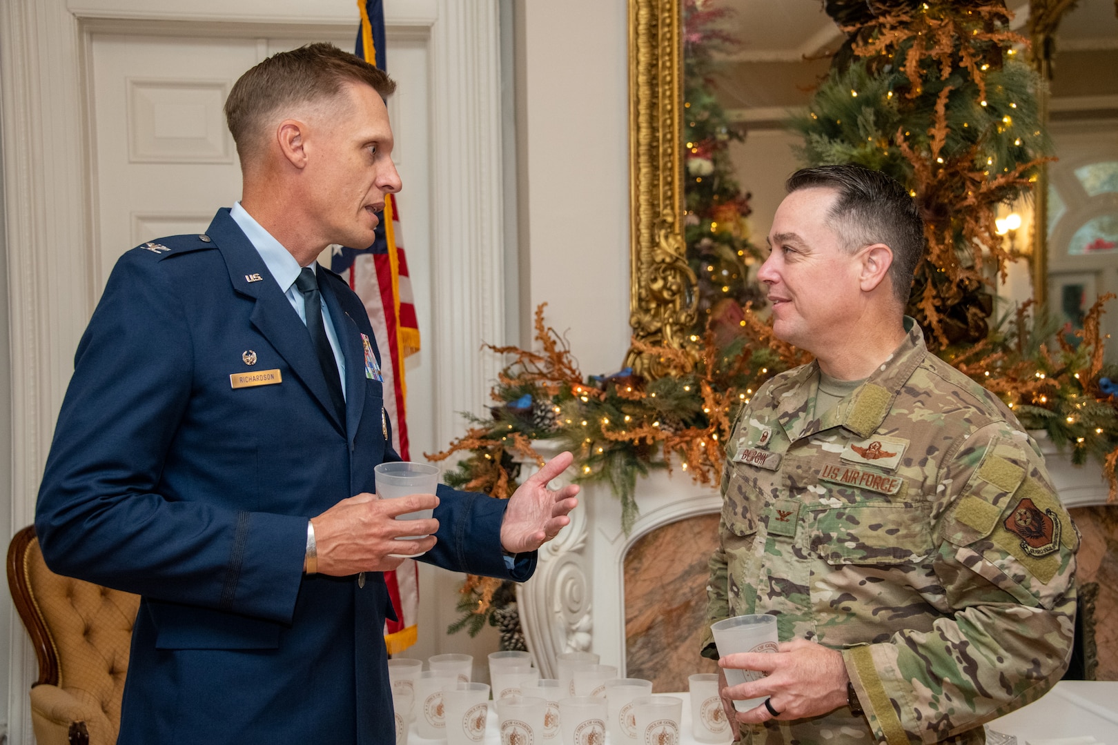 Col. Ryan Richardson, Commander, 42nd Air Base Wing, Maxwell Air Force Base, chats with Col. Jeremy Bergin, Commander, 27th Special Operations Wing