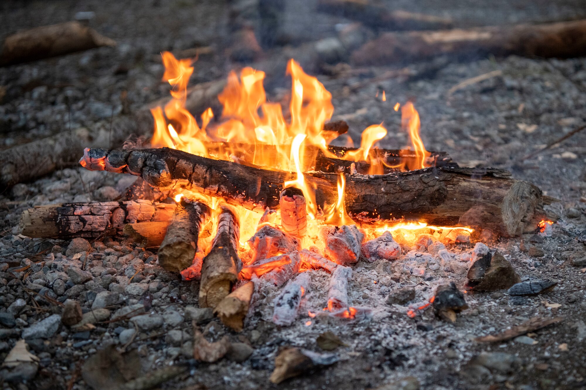 A fire burns during a survival, evasion, resistance and escape (SERE) training exercise at Draughn Range near Misawa Air Base, Japan.