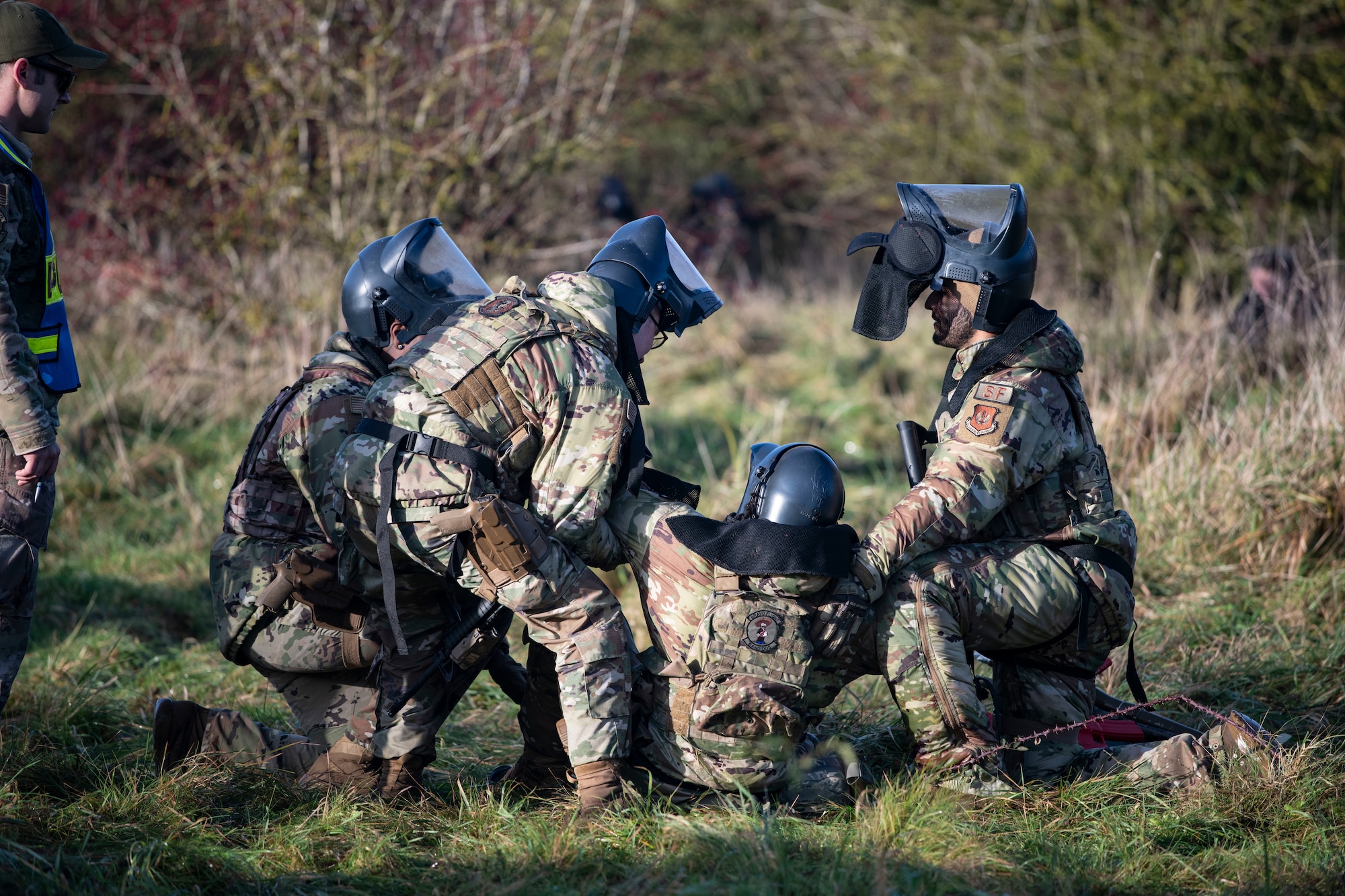 Defenders from the 423d Security Forces Squadron conduct a simulated casualty recovery, at RAF Molesworth