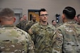 Sgt. Alex Tirone, information technology specialist, HHC, 653rd Regional Support Group, stands at attention after being promoted to corporal, Aug. 5, Mesa Armed Forces Reserve Center., Ariz. Tirone was promoted to sergeant Oct. 28.  (U.S. Army Reserve Photo by Maj. Alun Thomas, 653rd RSG Public Affairs)